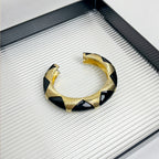 Oval Accent Cuff Bracelet with Bold Modern Contrast