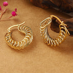 Bold Spiral Twist Hoop Earrings – Statement Clip-On Design