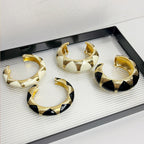 Oval Accent Cuff Bracelet with Bold Modern Contrast