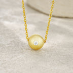 Elegant Necklace with Brushed Pendant & Sparkling Gemstone