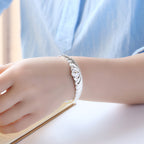 Crowned Open Cuff Bracelet with Ornate Sculpted Detail