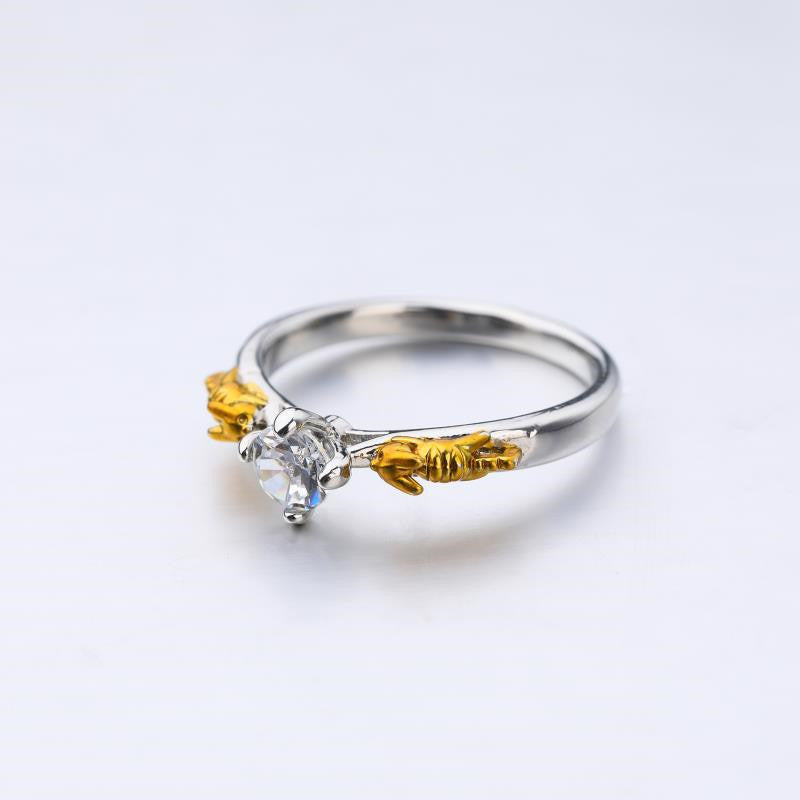 Golden Vine Solitaire Ring – Two-Tone Leaf Accent Design