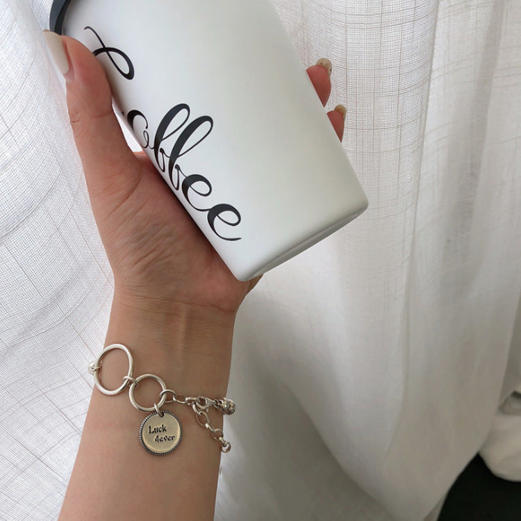 Mixed-Link Charm Bracelet with Contemporary Layered Style