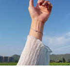 Delicate Chain Bracelet with Circular Symbol Detail