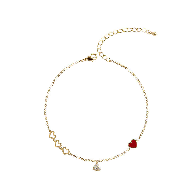 Delicate Chain Bracelet with Heart Charm Accents