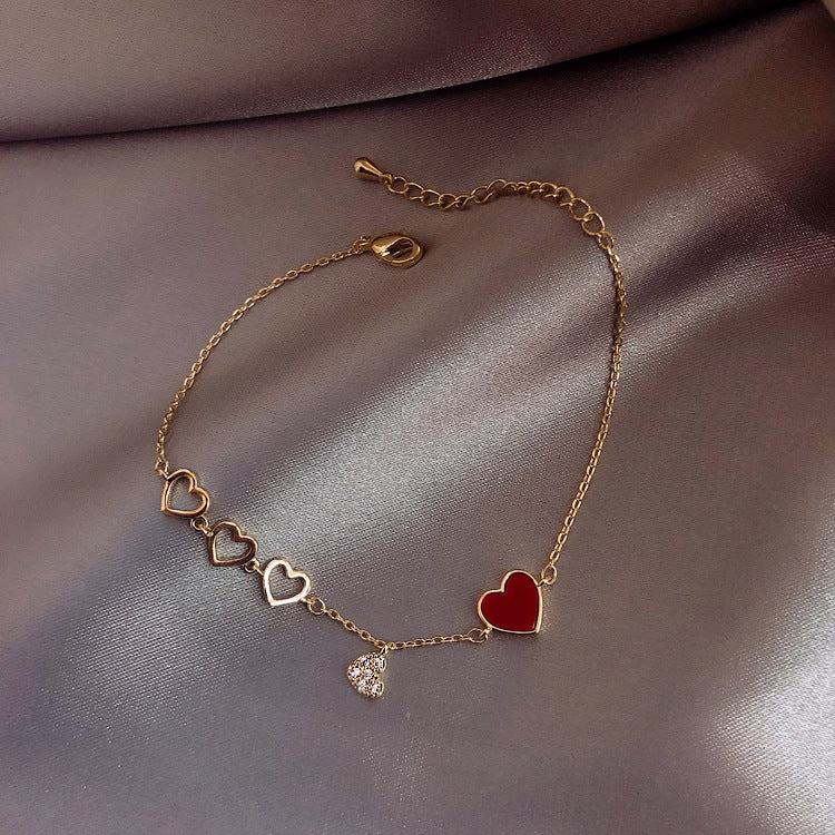 Delicate Chain Bracelet with Heart Charm Accents