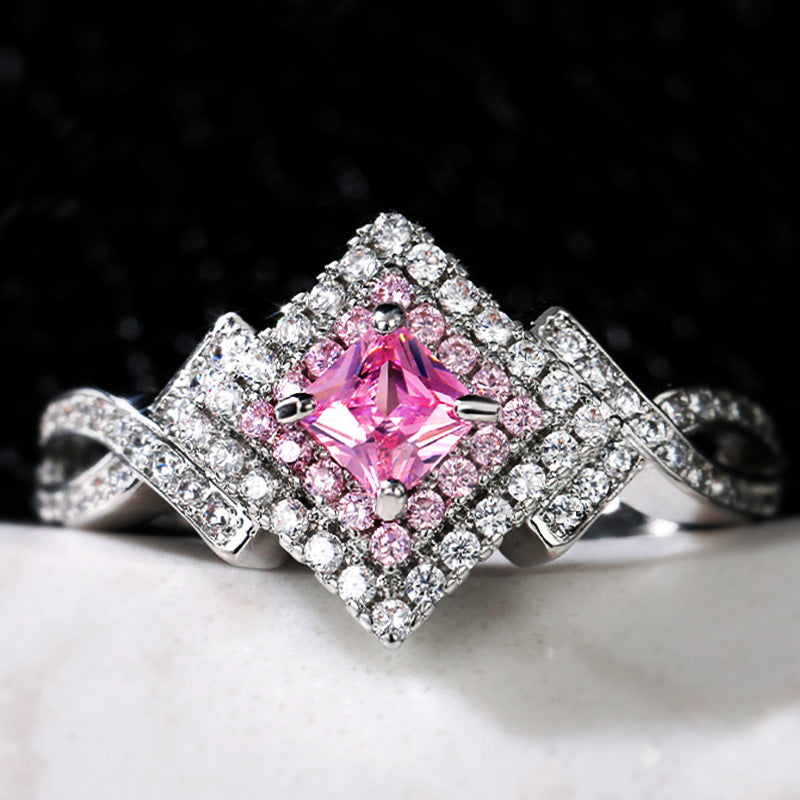 Princess-Cut Pink Halo Twist Ring in Sterling Silver