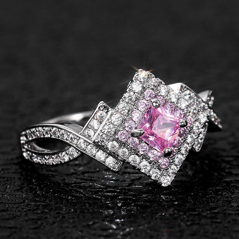 Princess-Cut Pink Halo Twist Ring in Sterling Silver