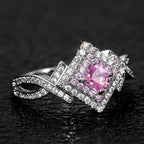 Princess-Cut Pink Halo Twist Ring in Sterling Silver