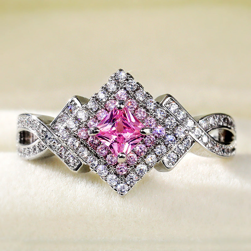 Princess-Cut Pink Halo Twist Ring in Sterling Silver