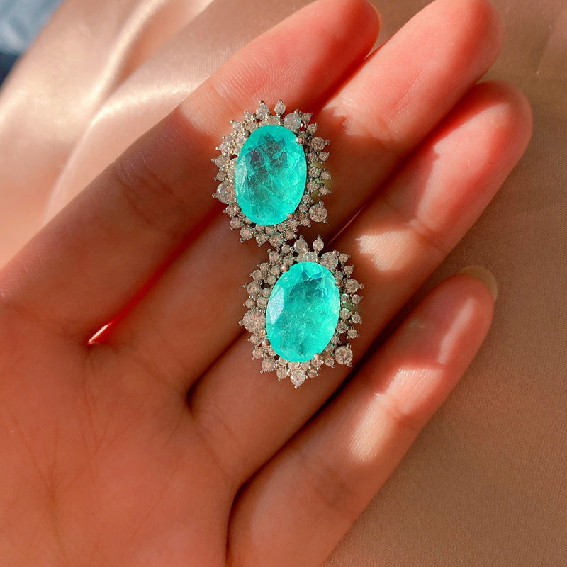 Vintage Oval Crystal Earrings with Radiant Emerald Glow