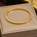 Minimalist Gold-Tone Bangle Bracelet with Crystal Accents