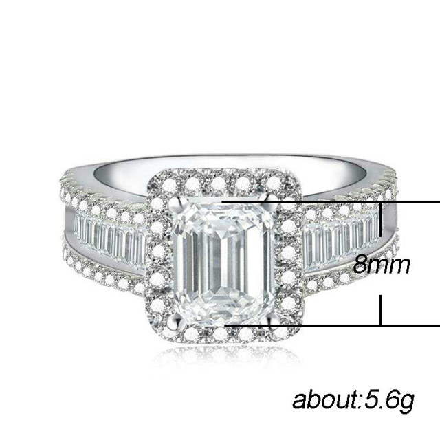 Emerald Cut Halo Engagement Ring with Baguette Accents