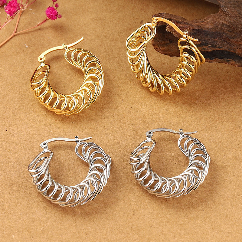 Bold Spiral Twist Hoop Earrings – Statement Clip-On Design