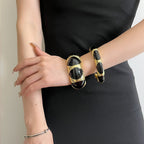 Oval Accent Cuff Bracelet with Bold Modern Contrast