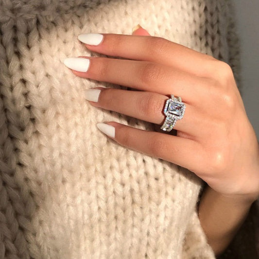 Emerald Cut Halo Engagement Ring with Baguette Accents