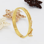 Chain-Detail Bangle Bracelet with Structured Lock Design