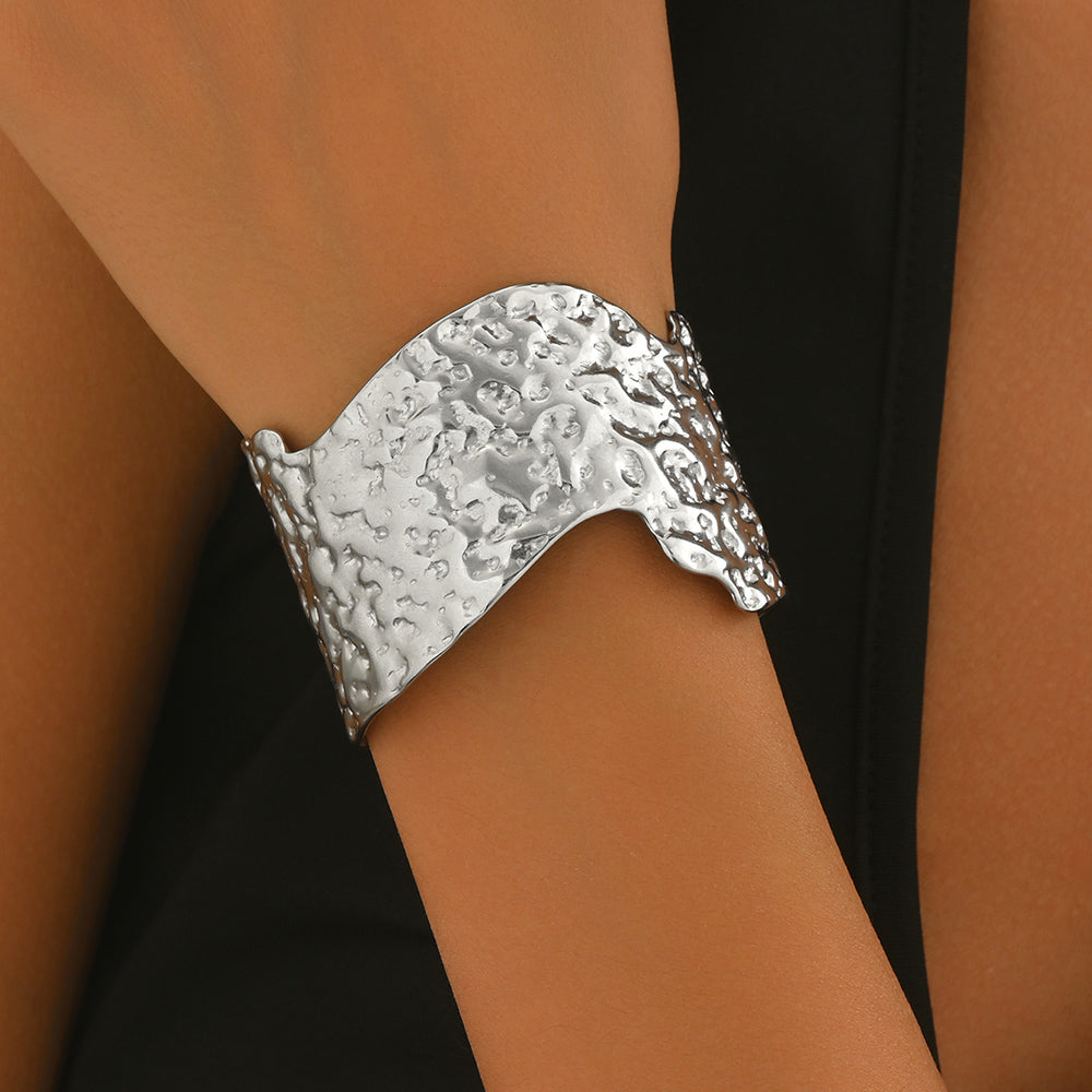 Sculptural Hammered Cuff Bracelet with Fluid Wave Design