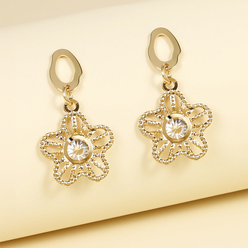 Radiant Sunburst Drop Earrings with Crystal Center