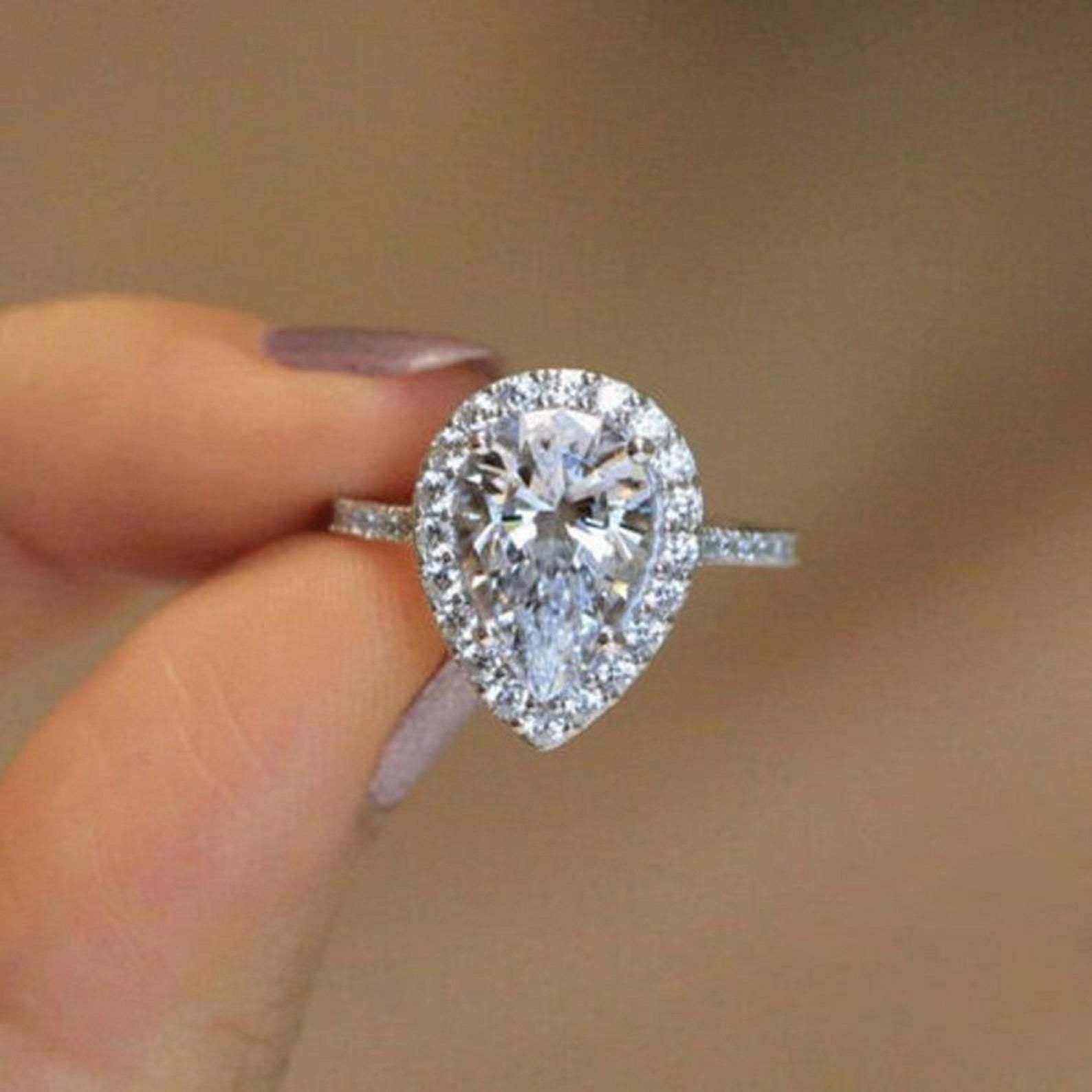 Pear Halo Solitaire Engagement Ring