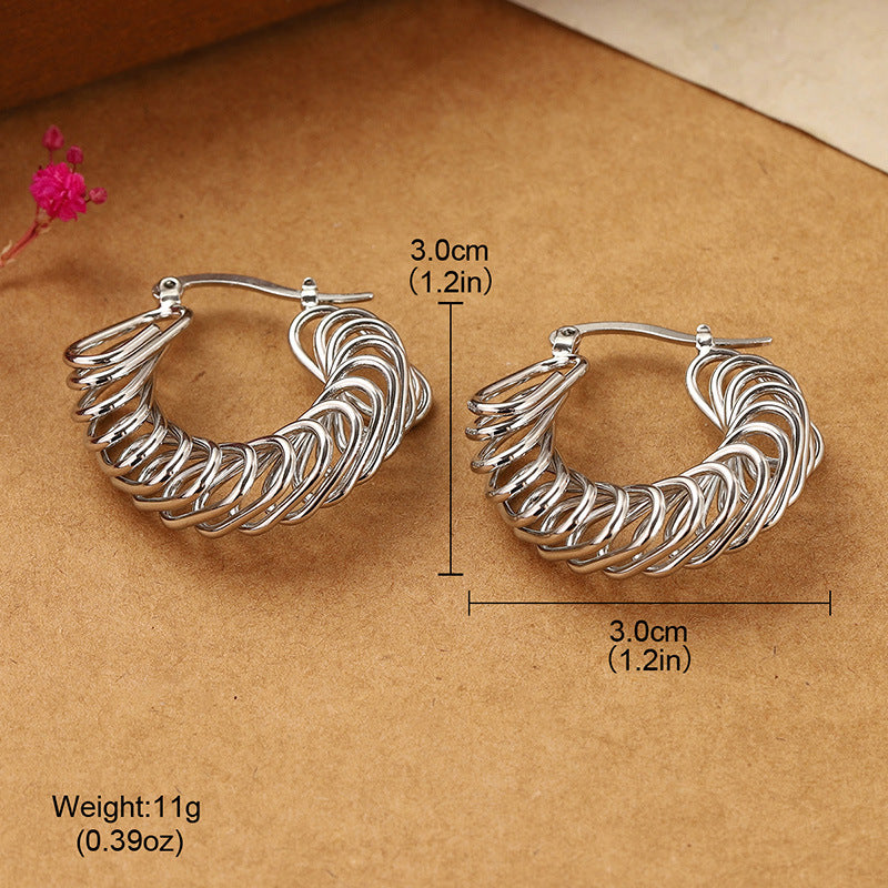 Bold Spiral Twist Hoop Earrings – Statement Clip-On Design