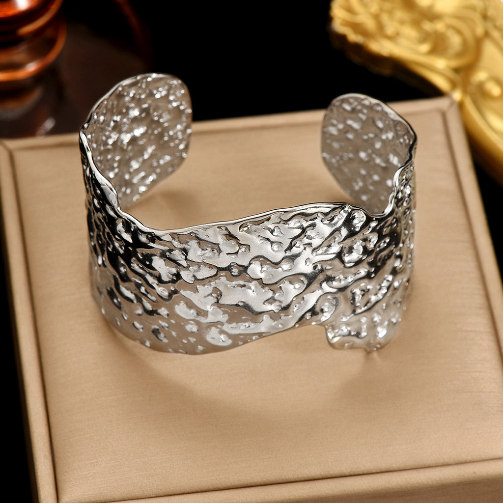 Sculptural Hammered Cuff Bracelet with Fluid Wave Design