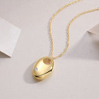 First Encounter Gold Oval Pendant Necklace