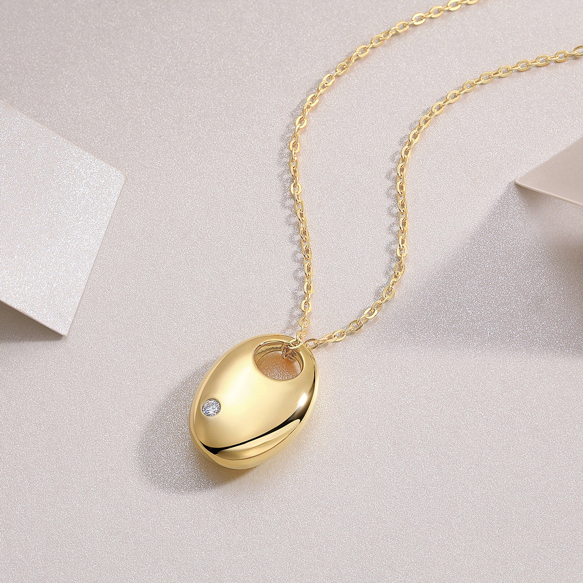 First Encounter Gold Oval Pendant Necklace