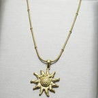 Radiant Sun Pendant Necklace & Matching Drop Earrings