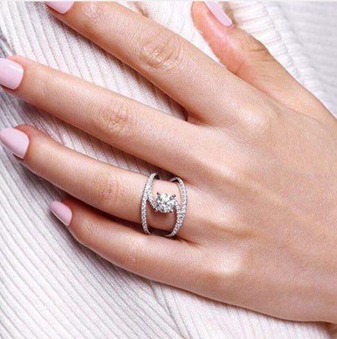 Infinity Sparkle Swirl Solitaire Ring