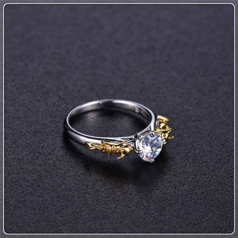 Golden Vine Solitaire Ring – Two-Tone Leaf Accent Design