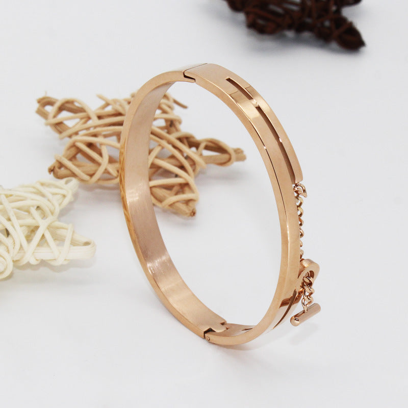 Chain-Detail Bangle Bracelet with Structured Lock Design