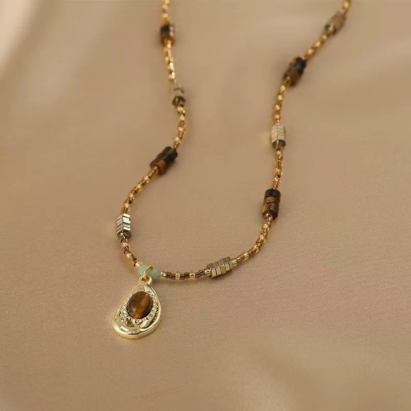 Vintage Gold Beaded Necklace with Teardrop Pendant