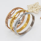 Chain-Detail Bangle Bracelet with Structured Lock Design