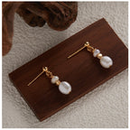 Delicate Pearl Drop Earrings with Elegant Gold Accents