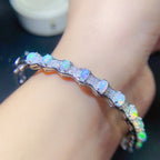 Oval Gem Detail Bangle Bracelet with Wave-Inspired Design