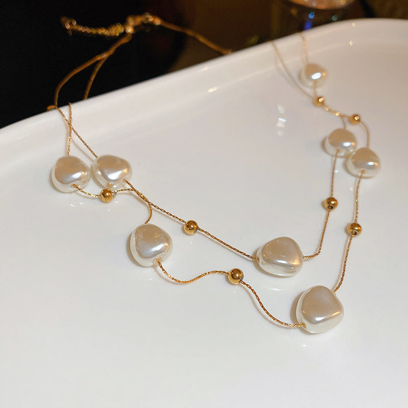 Layered Pearl Necklace with Delicate Gold Bead Accents