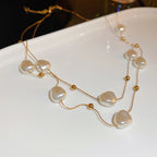 Layered Pearl Necklace with Delicate Gold Bead Accents
