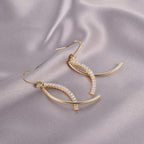 Elegant Crystal Arc Drop Earrings – Modern Minimalist Luxury