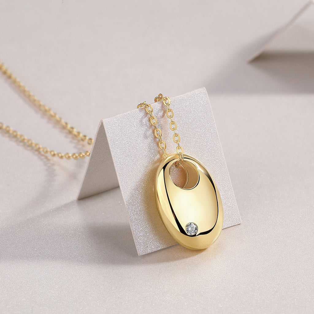 First Encounter Gold Oval Pendant Necklace