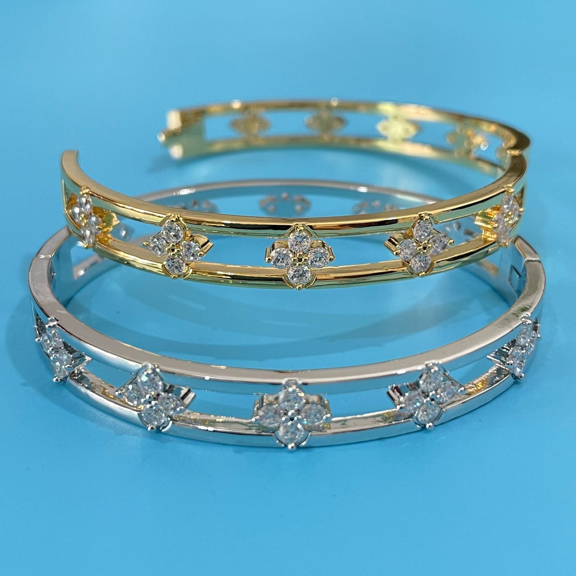 Floral Detail Bangle Bracelet with Elegant Openwork Design