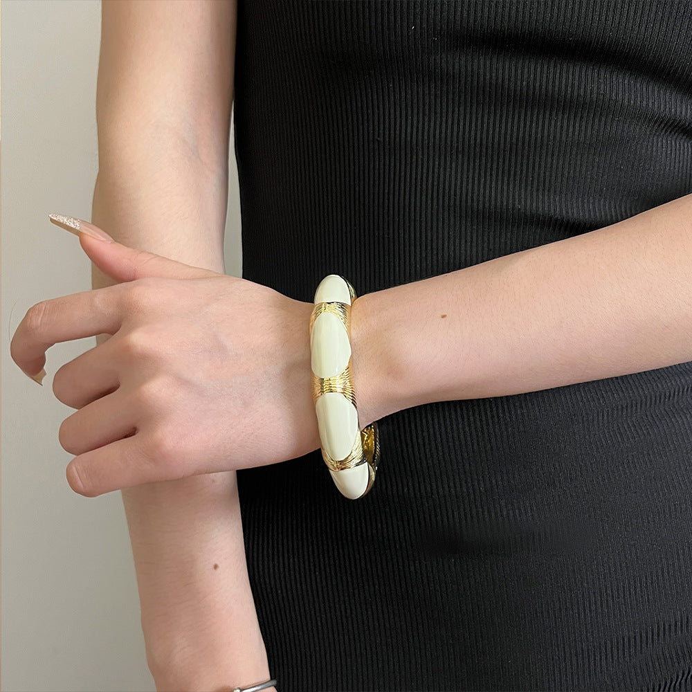 Oval Accent Cuff Bracelet with Bold Modern Contrast
