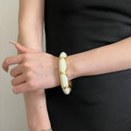 Oval Accent Cuff Bracelet with Bold Modern Contrast