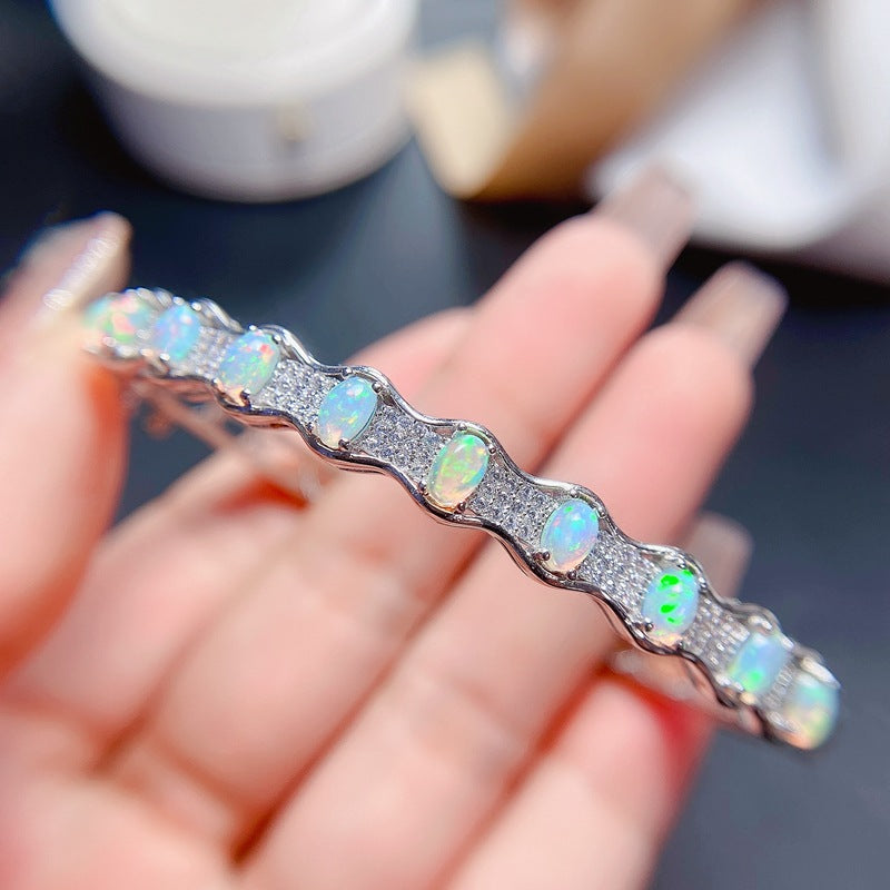 Oval Gem Detail Bangle Bracelet with Wave-Inspired Design