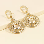 Radiant Sunburst Drop Earrings with Crystal Center