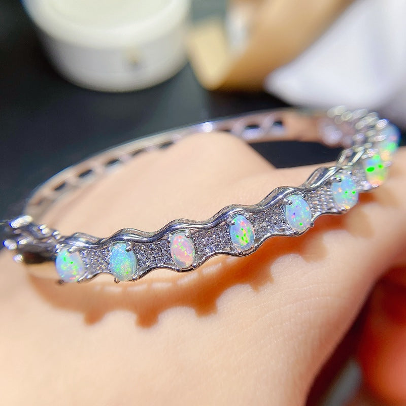 Oval Gem Detail Bangle Bracelet with Wave-Inspired Design