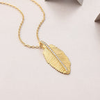 Fallen Leaves Starlight Necklace – Gold Leaf Pendant with Moissanite Accents