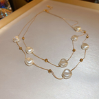 Layered Pearl Necklace with Delicate Gold Bead Accents