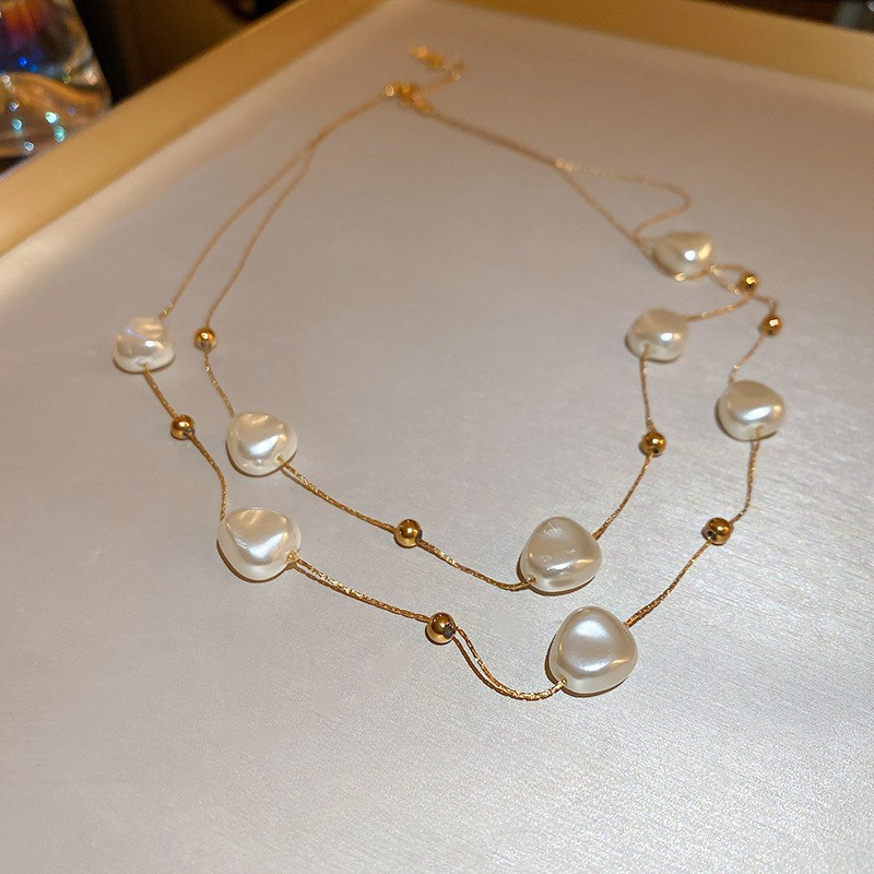 Layered Pearl Necklace with Delicate Gold Bead Accents