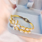 Floral Crystal Bangle Bracelet with Elegant Statement Design